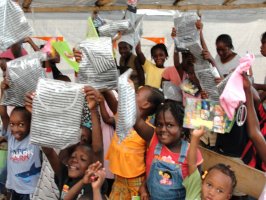 At every distribution the kids were so excited as they showed off their new gifts.