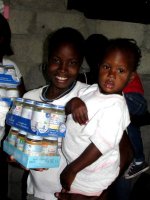 Pictures taken during a GAIN baby food distribution in Les Cayes shortly after the earthquake