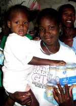 Seen here a GAIN baby food distribution in Les Cayes at World Missionary Evangelism church