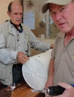 Seen here Don Warren, Founder of Equipping Ministries International and Dave Kanaga, head of the GAIN water project in the Yolanda Thervil Foundation distributing filters. 