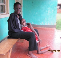 Joy and Ethel who live at the orphanage located next door for sexually abused street children in Uganda. 
