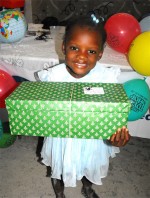Special thanks to the children of Power in the Blood Assemble who wrapped and packed these beautiful Make Jesus Smile shoeboxes for this child