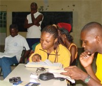 Seen here Island Impact on their Dominica 2008 trip studying the Word of God and fellowship during morning meditation.