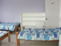 The north east facing bedroom has five single beds. 