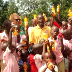 Seen here with some of the children in the Springs of Hope school.