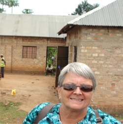 Jenny Tryhane one of the Trustees of ABCD flew in from Barbados to visit the land with the ten room warehouse on site.