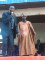 Pastor Abraham seen here with his spiritual father, Apostle Pinos on stage.