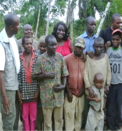 The Pygmies in the front row with a group from CEPCI at the back row including Bishop Pinos on the left.
