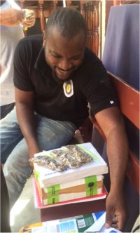 Imran seen here distributing our Moringa (Benzoliv) curriculum including seeds to the schools involved in the distribution.