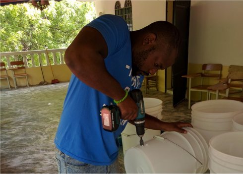 United Caribbean Trust Mission trip to help survivors of Hurricane Matthew in Haiti with Sawyer filtered clean water as fears of an increase in cholera cases grow 