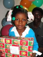 At last Pastor Banes was able to deliver the Make Jesus Smile shoeboxes to the children at his church.