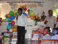 The children of Church of God of Prophecy Port Salut receive their Make Jesus Smile shoeboxes