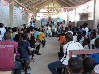 The church in the YWAM base was packed with excited children as we began the 2010 Make Jesus Smile shoebox distribution