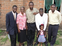 Seen here to her right with Pastor William the Uilwa KIMI Coordinator, to her left Pastor David the Mbeya KIMI Coordinator, Pastor Mango the Malawi teacher and the Pastor of the Uliwa Assemblies of God church that hosted the teaching