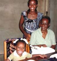 Pastor David's wife Stella with Pastor Enid and her lovely little girl Loveness 