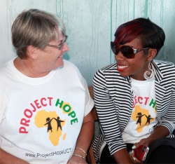 Seen here at the Project Hope Launch at Limegrove having a laugh with Jenny Tryhane, founder of United Caribbean Trust...