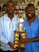 Pastor Lafleur and Pastor Rodrigue from Restoration Ministries Haiti with the winning trophy.