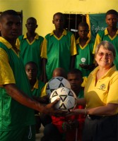 Haiti football team receiving their new footballs