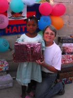 Jenny Tryhane distributing the Make Jesus Smile shoeboxes