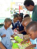 Barbados school packing shoeboxes in the Make Jesus Smile programme 