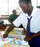 Right - St Lucy Secondary senior children in Barbados packing shoe boxes for Haiti.