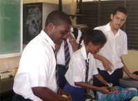 Queens College Secondary School in Barbados pack Easter Make Jesus Smile shoeboxes  Easter 2009