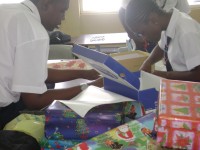 Queens College Secondary School in Barbados pack Easter Make Jesus Smile shoeboxes  Easter 2009