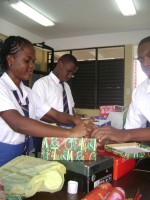 Queens College Secondary School in Barbados pack Easter Make Jesus Smile shoeboxes  Easter 2009