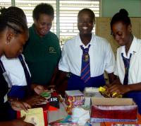 St Lucy Secondary school seniors pack gifts for children in the Caribbean