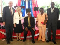 Seen here with Apostle James Cooper and his wife and the covering Apostle. Click to enlarge.