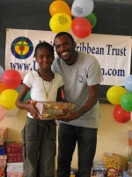 mran  Richards distributing the Make Jesus Smile shoeboxes in Brokoponda
