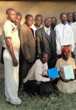 The graduates with their certificates and curriculums