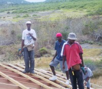 YWAM helping with the roof as part of their discipleship outreach missions programme