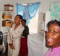 Sister Denise leading worship at the Mission House of Prayer