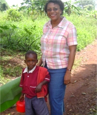 Dr Veronica with Fra nk on his way to school