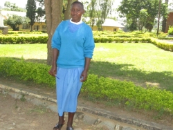 Student at the Christ the Kings school in Kalisizo