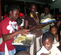 Chicken curry and roti had been prepared and after the party every child left with food and popcorn