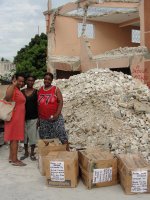 Family Hampers were distrbuted as far north as Goniave, St Marc, Bon Repos, Jacmel in the south, Petit Gouve (seen here at the Methodist base) and Les Cayes.